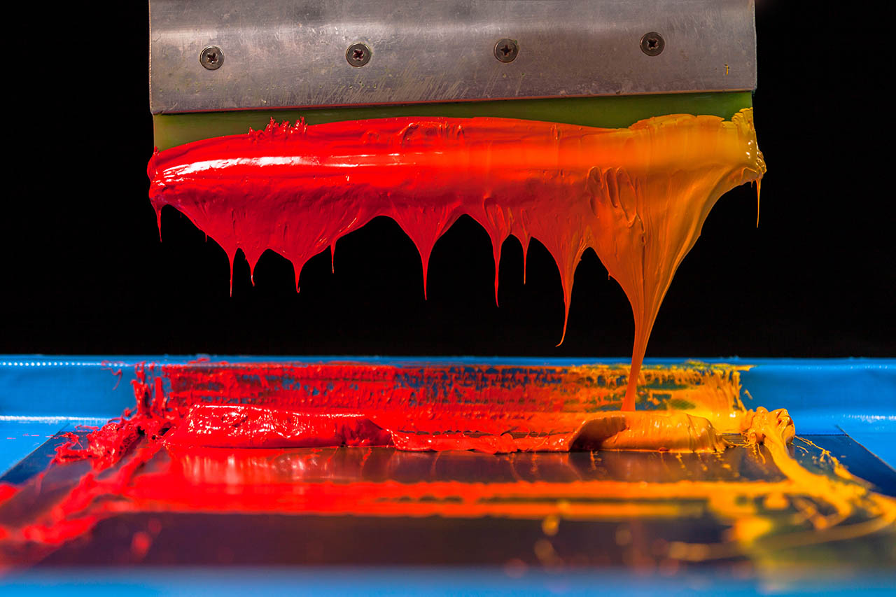 Vivid printing ink lifted on a squeegee, from the CRE8 website